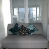 Olive Colored Sofa- $125 Good Condition offer Home and Furnitures