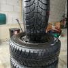 SNOW TIRES WITH RIMS 195/65/R15 HANKOOK SET OF 4 - $475.00.