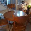 Brown wooden tables and 4 high backed chairs. Great codition.