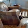 Leather relciner $150 and Ethan Allen light green leather chair and ottoman $150