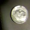 It's a 1966 dime no ment merk and rust on cheak  used but it will Become better when graded