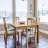 Formal dining table with 8 chairs and breakfast table with 6 chairs