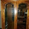 Wood armoire with mirrored doors