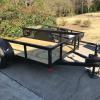 5' by 8' utility trailer with ramp tailgate offer Lawn and Garden