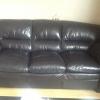 Black leather chesterfield and chair