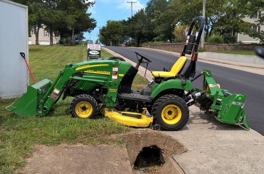 John Deere 2305 w/ front bucket, mower and tiller World Classifieds