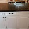 Excel island with Black Pearl Granite top like new