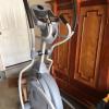 Elliptical excercise machine and electric lawn mower offer Garage and Moving Sale
