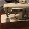 Singer Sewing Machine (in cabinet)