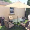 Outdoor table and chair set with umbrella offer Lawn and Garden