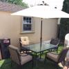 Outdoor table and chair set with umbrella