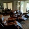 Brown leather couch and recliner. All electric power. 2 years old. Couch has two recliners.