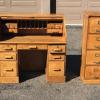 wood roll top desk, matching filing cabinet, also a book case