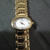 Women's gold pulsar watch