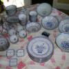 96 Piece 8 place setting dishware, Blue Rice Pattern with red and gold accent $100