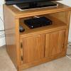Oak television stand on wheels