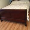 Queen bed  and mattress with box spring (looks new) offer Home and Furnitures