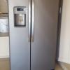 LIKE NEW SIDE BY SIDE REFRIGERATOR offer Appliances