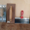 4 metal, 1 wood masonry/wallboard trawels offer Tools
