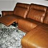 Genuine Leather 3 piece sectional with electronic recliner.
