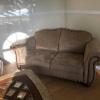 Loveseat and coffee table  offer Home and Furnitures