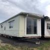 $8,000 Double wide for sale, on axles ready to be moved, WITH TITLE!