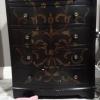 Side table black with painting on front $35 offer Home and Furnitures