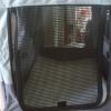 Dog/ canvas cage with plush interior.