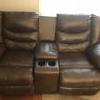 Ashley Linebacker reclining loveseat 