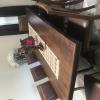 8ft wooden table and 8 leather chairs