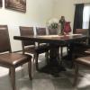 8ft wooden table and 8 leather chairs