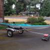 Elaho Necky fiberglass kayak and rack and roll trailer