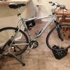 TREK 7700 MultiTrack bicycle and GIANT stationary trainer w/CycleOps front-wheel mount