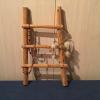 Small wooden Native American ladder with decor