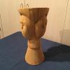 3 faced carved wooden statue 