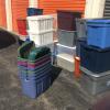 Lot of 36 plastic storage tubs with covers.