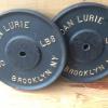 2 - 50 lb standard weight plates 