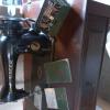 Antique Singer sewing machine with cabinet