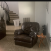 Sectional sofa, coffee table, recliner, entertainment center and six person pub table.