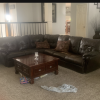 Sectional sofa, coffee table, recliner, entertainment center and six person pub table.