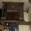 Antique Singer sewing machine in cabinet 