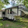 35ft 5th wheel sandpiper by forest river offer RV