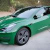 2021 Tesla Model 3 Standard Range Plus, finished in Pearl White Multi-Coat with an Avery Dark Green exterior wrap and a 