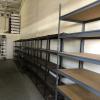 Steel storage  shelves and 2X4s offer Garage and Moving Sale