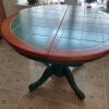 green tile and wood top table and 4 chairs dark green and wood offer Garage and Moving Sale