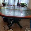 green tile and wood top table and 4 chairs dark green and wood