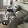 Gray leather Love Seats with recliners