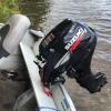 14 foot Lowe fishing boat, Suzuki motor, & trailer offer Boat