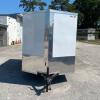 6x10 Single Axle Enclosed Cargo Trailer with Rear Ramp Door offer Truck
