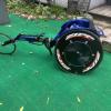 a racing wheel chair , dry land trainer and special bags for carbon fibre wheels on air plane